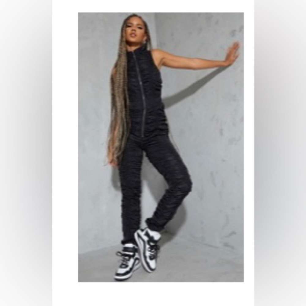 Pretty Little Thing black ruched jumpsuit.SZ 8